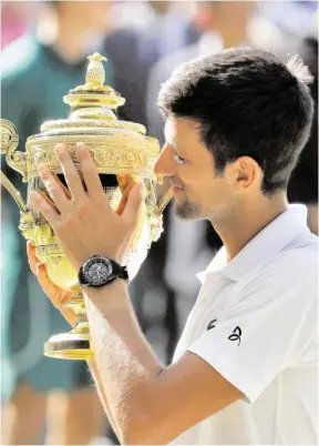  ?? BILD: SN/AP ?? Novak Djokovic genoss die Augenblick­e des Triumphs.