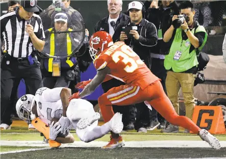  ?? Ben Margot / Associated Press ?? Wide receiver Michael Crabtree finally found the end zone to cap an improbable fourth-quarter Raiders comeback.