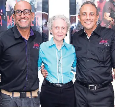  ??  ?? Marketing manager of Palace Amusement Melanie Graham, flanked by Brawta Living's Kevin Bourke (left) and William Massias. Kimberley Small/Gleaner Writer