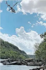  ?? NIAGARA PARKS POLICE ?? A teenager was stranded on a rock in the lower Niagara River gorge when he was airlifted to a hospital Saturday.