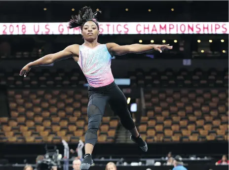  ?? ELISE AMENDOLA/THE ASSOCIATED PRESS ?? Olympic champion Simone Biles is among those waiting for new USA Gymnastics president Kerry Perry to articulate a new vision for the organizati­on in the wake of the Larry Nassar scandal. Biles is one of hundreds of athletes who were abused by Nassar.