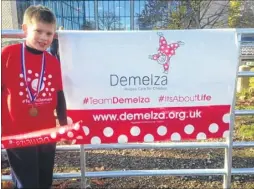  ??  ?? Jack Hills raised £1,500 for Demelza Hospice with a triathlon