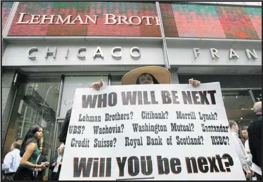  ?? Photo / AP ?? Lehman Brothers collapses in 2008. Ten years later, debt has hit a new peak.