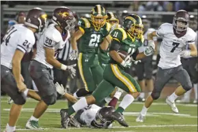  ?? File photo ?? Ryan Valdes (11) will provide support in the ground game at running back and on defense at linebacker tonight against San Fernando.