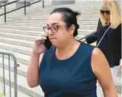  ?? LARRY NEUMEISTER/AP ?? Peaches Stergo, left, leaves Manhattan federal court in New York on Thursday after she was sentenced to more than four years in prison for cheating an 87-year-old Holocaust survivor of $2.8 million.