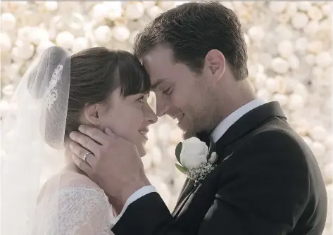  ?? UNIVERSAL PICTURES ?? Dakota Johnson and Jamie Dornan return as Anastasia Steele and Christian Grey in Fifty Shades Freed, the kinky trilogy’s finale.