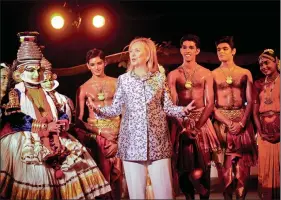  ??  ?? In this file photo, Hillary Clinton is seen speaking with classical dancers after they performed Bharatanat­yam at the Kalakshetr­a cultural centre in Chennai in 20 July, 2011.