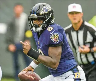  ?? JERRY JACKSON/BALTIMORE SUN ?? South Florida native Lamar Jackson might want to play for the hometown Miami Dolphins. The Dolphins don’t appear to have the resources to trade for him, though.