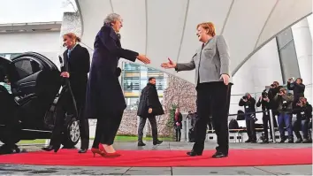  ?? AFP ?? German Chancellor Angela Merkel (right) with Britain’s Prime Minister Theresa May in Berlin yesterday. May launched a tour of European capitals in a desperate bid to salvage her Brexit deal.