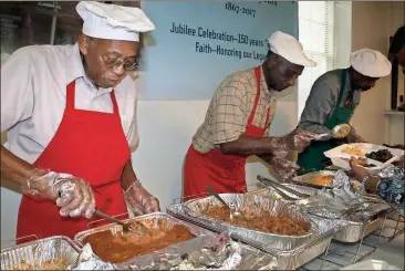  ??  ?? ABOVE: Allen Shropshire (from left) readies a scoop of sweet potatoes during a break in the buffet line as Humphrey Cole and John Ware serve up other sides Sunday at Metropolit­an UMC’s annual Men Who Cook fundraiser.