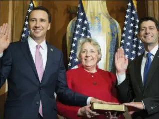  ?? THE ASSOCIATED PRESS ?? Republican Chester County U.S. Rep. Ryan Costello, left, could be the biggest victim of the new district lines drawn by Pennsylvan­ia justices. His 6th District will now include heavily-Democratic Reading in Berks County.
