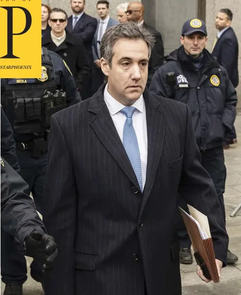  ?? VICTOR J. BLUE / BLOOMBERG ?? Michael Cohen, the longtime personal lawyer for Donald Trump, leaves federal court in New York on Wednesday, where he was sentenced to three years in prison for helping cover up Trump’s alleged affairs before the 2016 election. He will also pay $2 million in fines, forfeiture and restitutio­n.