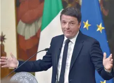  ?? — AFP ?? Italy’s Prime Minister Matteo Renzi announces his resignatio­n during a press conference at the Palazzo Chigi in Rome.