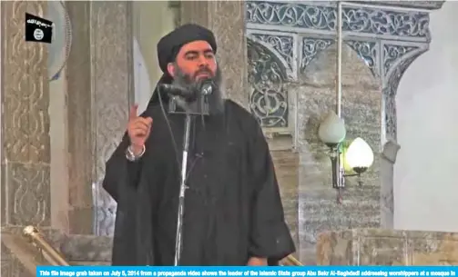  ??  ?? This file image grab taken on July 5, 2014 from a propaganda video shows the leader of the Islamic State group Abu Bakr Al-Baghdadi addressing worshipper­s at a mosque in the northern Iraqi city of Mosul, held at the time by IS. — AFP