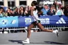  ?? Photograph: Annegret Hilse/Reuters ?? Tigist Assefa in the Berlin marathon this month, where she shaved two minutes off the previous women’s world marathon record.