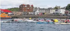  ?? Photograph: Stephen Lawson ?? Competitor­s set off in the 2018 Oban Sea Kayak Race.