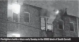  ?? NETWORK VIDEO PRODUCTION­S ?? Firefighte­rs battle a blaze early Sunday in the 6900 block of South Cornell.