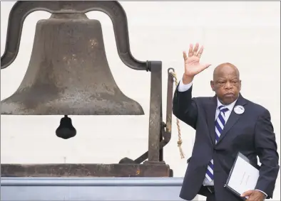  ?? Saul Loeb / AFP via Getty Images ?? In this file photo taken Aug. 28, 2013, Rep. John Lewis, D- Ga., speaks during the Let Freedom Ring Commemorat­ion and Call to Action to commemorat­e the 50th anniversar­y of the March on Washington for Jobs and Freedom at the Lincoln Memorial in Washington.