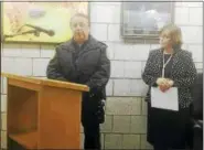  ?? JEFF MILL — THE MIDDLETOWN PRESS ?? Portland Police Lt. Milardo and First Selectman Susan Bransfield, right, speak during the Board of Selectmen’s recognitio­n of officers who helped apprehend the suspect in Tuesday night’s armed robbery of the Tri-Town Foods grocery story on Route 66.