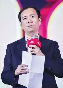  ?? AFP ?? THIS FILE PICTURE taken on Nov. 12, 2017 shows Alibaba CEO Daniel Zhang speaking shortly after the end of the 11.11, or Singles Day shopping festival, at a gala event in Shanghai.