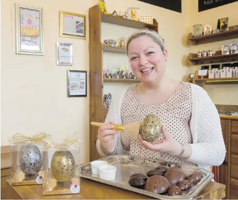  ?? JENELLE SCHNEIDER/PNG ?? Anne-Geneviève Poitras, owner of Chocolater­ie de la Nouvelle France, says the creation of chocolate Easter eggs began in France and Germany.