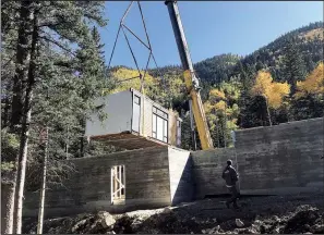  ?? Jerry Courvoisie­r ?? This Taos, N.M., home is a six-module, three-bedroom, three-bath Method Cabin designed by Prentiss Balance Wickline Architects built over a site-built lower level that contains a garage, ski room and game room.