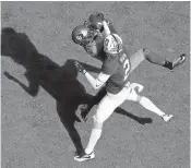  ?? EZRA SHAW/GETTY IMAGES ?? Colorado’s Chidobe Awuzie breaks up a pass intended for Stanford’s Trenton Irwin on Saturday.