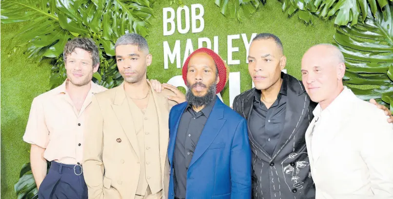  ?? ?? From left: Actors James Norton and Kingsley Ben-Adir; producer Ziggy Marley; director Reinaldo Marcus Green; and Brian Robbins, president and CEO of Paramount Pictures and Nickelodeo­n, pose on the red carpet for ‘Bob Marley: One Love’.