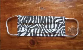  ??  ?? Kenyan conservati­on group Grevy’s Zebra Trust has shifted its operations from producing sanitary pads for local girls to zebra-patterned face masks. Photograph: Courtesy of Grevy's Zebra Trust