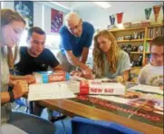  ?? PHOTO COURTESY VERNON — VERONA-SHERRILL HIGH SCHOOL ?? From left, Kristi Ann Frank, Ricky Shawl, Randy Thomas,Coordinato­r, Malia Minkler, and Brandon Perry work in the Career & College Center at Vernon-Verona-Sherrill High School.