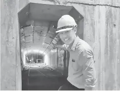  ??  ?? Tiong showing the massive tunnel deep inside the Kuala Tatau bridge. The bridge is strengthen­ed with two tiers of concrete slabs.