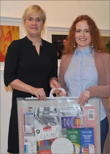 ??  ?? Térése Donaghy, Ó Fiaich Institute of Further Education who received 2nd place in the PLC Section of the LMETB Robert Ballagh Art Competitio­n pictured receiving her award from Eilish Flood at the awards ceremony held in the Droichead Arts Centre.