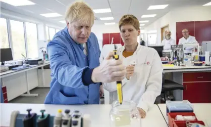  ?? Photograph: WPA Pool/Getty Images ?? The prime minister visiting the Mologic laboratory in Bedford to see testing kits being developed on 6 March.