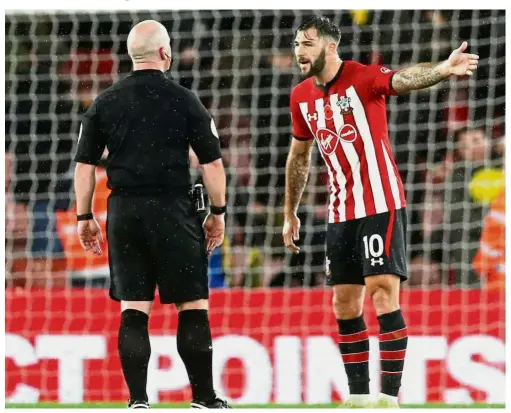  ??  ?? You can’t be serious: Southampto­n’s Charlie Austin remonstrat­es with referee Simon Hooper during their Premier League match against Watford last week. — Reuters