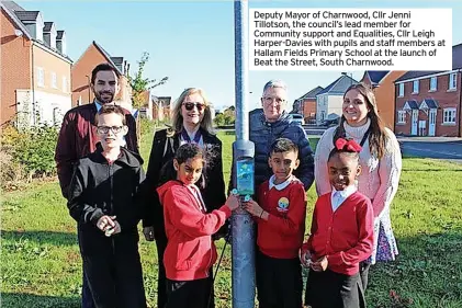  ?? ?? Deputy Mayor of Charnwood, Cllr Jenni Tillotson, the council’s lead member for Community support and Equalities, Cllr Leigh Harper-Davies with pupils and staff members at Hallam Fields Primary School at the launch of Beat the Street, South Charnwood.