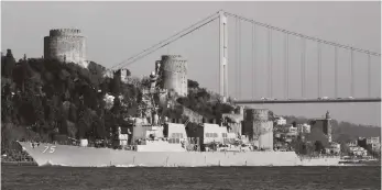  ?? Reuters ?? A US Navy ship sets sail on Istanbul’s Bosphorous, on its way to the Mediterran­ean, in 2019