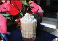  ?? PHOTO COURTESY OF PJW RESTAURANT GROUP ?? This seasonal sip combines whiskey, vodka, chocolate syrup, cold-brew coffee and eggnog.