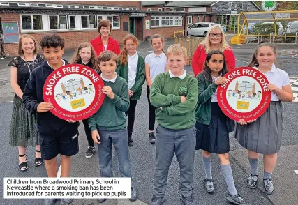  ?? ?? Children from Broadwood Primary School in Newcastle where a smoking ban has been introduced for parents waiting to pick up pupils