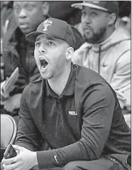  ?? Arkansas Democrat-Gazette/BENJAMIN KRAIN ?? Desmond Howard cheers on younger brother Jordan Howard from the sideline during UCA’s victory over Stephen F. Austin on Wednesday night in Conway.