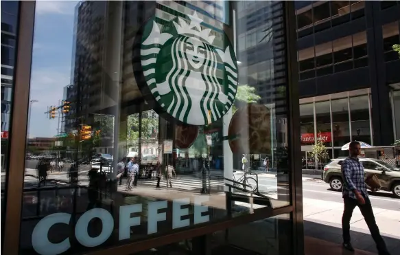  ?? AFP ?? A Starbucks shop in Philadelph­ia. The North America market accounted for more than 70 per cent of Starbucks’ overall sales