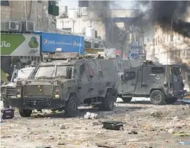  ?? MAJDI MOHAMMED/AP ?? Nablus in the West Bank was the scene of clashes Feb. 22, one event in a yearlong spate of violence.