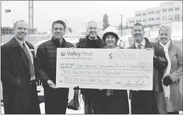  ??  ?? Valley First president Susan Ewanick presents a $150,000 donation to the South Okanagan Similkamee­n Medical Foundation for Penticton Regional Hospital’s new Patient Care Tower. From left, Valley First’s Roger Houle, MLA Dan Ashton, SOS Medical...