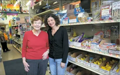  ?? Pam Panchak/Post-Gazette ?? Sylvia and Marcia Feinberg have announced the closing of the Mike Feinberg Co. in the Strip District after 60 years in business. Marcia Feinberg, right. has been running the store since her father's death 11 years ago with the help of her mother Sylvia.