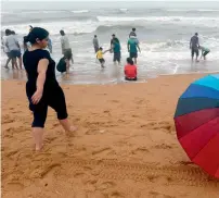  ?? AFP ?? Tourists on Calangute Beach in Goa. —
