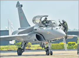  ?? PTI ?? IAF pilots board a Rafale fighter aircraft during its induction ceremony at the Ambala air base on September 10. Five Rafale jets of the 36 reached the Ambala airbase on July 29.