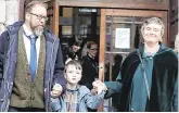  ?? PHOTO: COLLINS COURTS ?? Family pride: Iarlaith with his parents, Fiachra and Deborah after the High Court action.