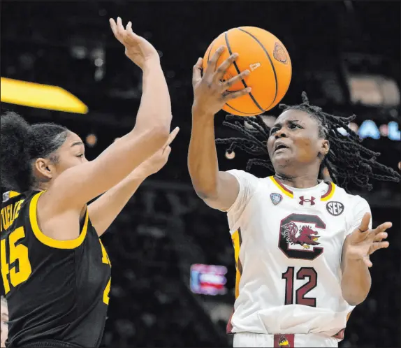  ?? Morry Gash The Associated Press ?? South Carolina guard Milaysia Fulwiley had nine points, four rebounds and four assists off the bench in the national title game win over Iowa.