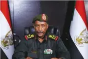 ?? SUDAN ARMED FORCES VIA AP ?? Gen. Abdel-Fattah Burhan, commander of the Sudanese Armed Forces, speaks Friday at an undisclose­d location.