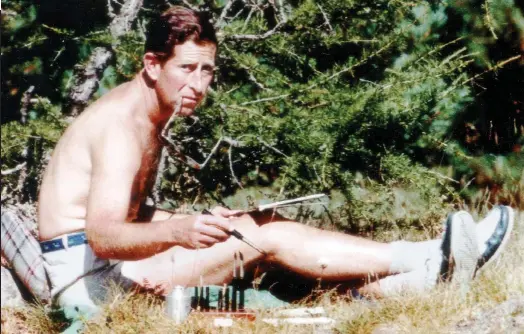  ??  ?? Portrait of an artist: Charles with his beloved paints — this time in the Alps. Diana resented time spent on his art