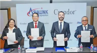  ?? ?? Asialink Finance Corp., a trailblaze­r in SME nancing, and Creador, a Southeast Asian private equity rm, sign a landmark P4-billion investment agreement. Attending the signing ceremony are (from left) Asianlink president and COO Eillen Mangubat, Asian link founder and CEO Robert Jordan Jr., Creador managing director Omar Mahmoud and Asialink chairman Ruben Lugtu II.